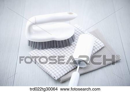 Picture - brush and discloth with roller. Fotosearch