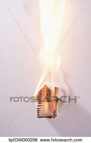 Burning house match View Large Photo Image Stock Photo - Burning house match. Fotosearch