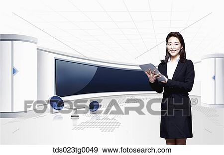 Stock Photo - business woamn doing works using tablet pc. Fotosearch