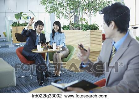 Businessmen saying hello to each other View Large Photo Image Stock Image - Businessmen saying hello to each other. Fotosearch