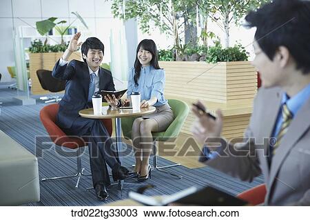 Businessmen saying hello to each other View Large Photo Image Stock Image - Businessmen saying hello to each other. Fotosearch