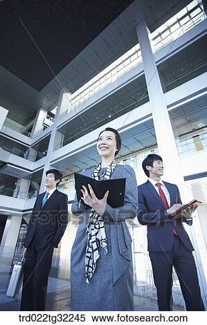 Businessmen with suitcase, planner, and document file View Large Photo Image Stock Photography - Businessmen with suitcase, planner, and document file. Fotosearch