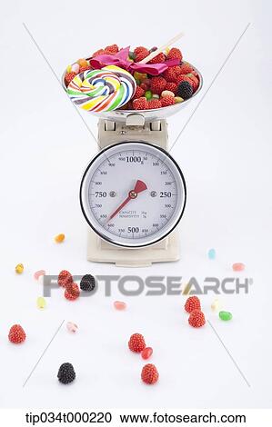 Candy and Jelly around the scale View Large Photo Image Stock Image - Candy and Jelly around the scale. Fotosearch