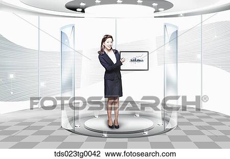 Stock Image - career woman shows the graphs . Fotosearch