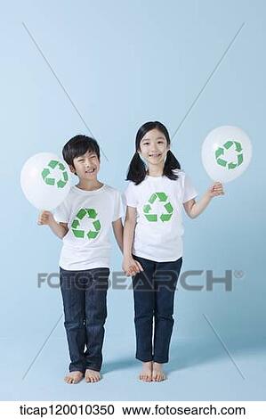 Children holding recycling balloons View Large Photo Image Stock Image - Children holding recycling balloons. Fotosearch