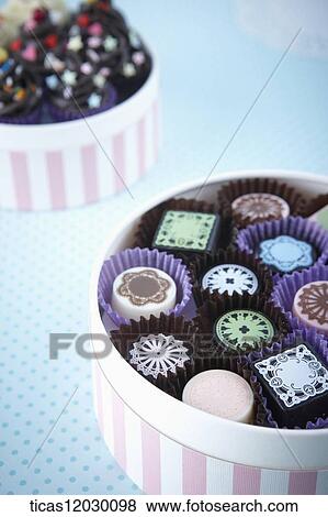 Chocolate and cupcake gift package View Large Photo Image Stock Photo - Chocolate and cupcake gift package. Fotosearch