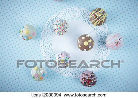 Chocolate ball with colorful decoration View Large Photo Image Picture - Chocolate ball with colorful decoration . Fotosearch