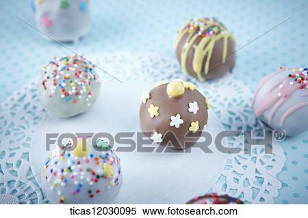 Chocolate ball with colorful decoration View Large Photo Image Stock Photography - Chocolate ball with colorful decoration . Fotosearch