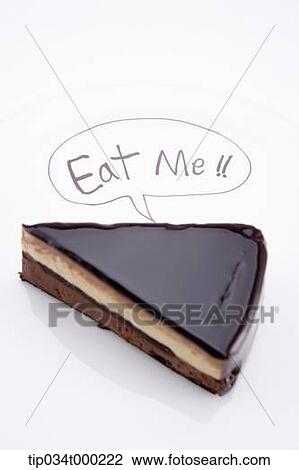 Chocolate cake with eat me decoration View Large Photo Image Stock Image - Chocolate cake with eat me decoration . Fotosearch