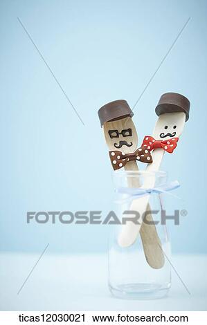 Chocolate character spoon in a glass bottle View Large Photo Image Stock Image - Chocolate character spoon in a glass bottle. Fotosearch