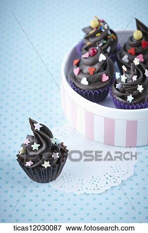 Chocolate cupcake in pink gift box View Large Photo Image Stock Photo - Chocolate cupcake in pink gift box. Fotosearch