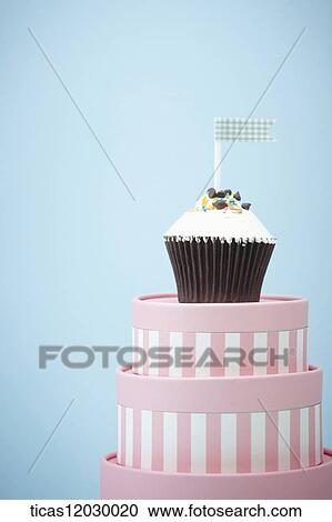 Chocolate cupcake on the pink box View Large Photo Image Stock Image - Chocolate cupcake on the pink box. Fotosearch