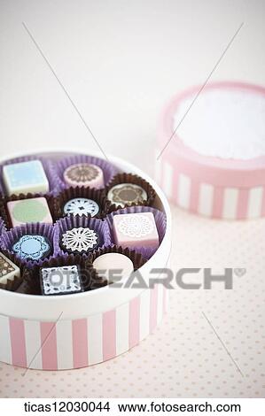 Chocolate in the pink gift box View Large Photo Image Picture - Chocolate in the pink gift box. Fotosearch