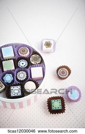 Chocolate in the pink gift box View Large Photo Image Stock Photograph - Chocolate in the pink gift box. Fotosearch