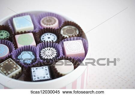 Chocolate in the pink gift box View Large Photo Image Stock Photography - Chocolate in the pink gift box. Fotosearch