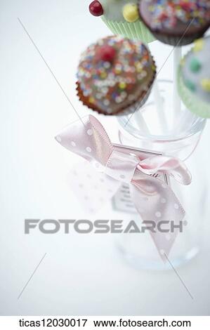 Chocolate stick in a glass bottle View Large Photo Image Stock Photo - Chocolate stick in a glass bottle. Fotosearch
