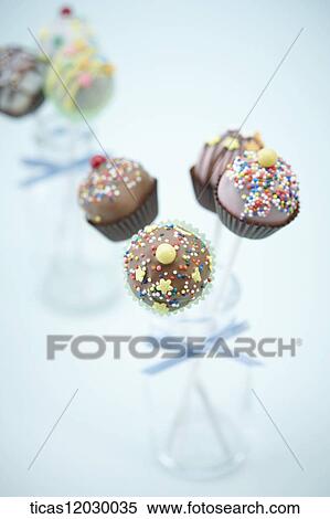 Chocolate stick in a glass bottle View Large Photo Image Stock Photography - Chocolate stick in a glass bottle. Fotosearch