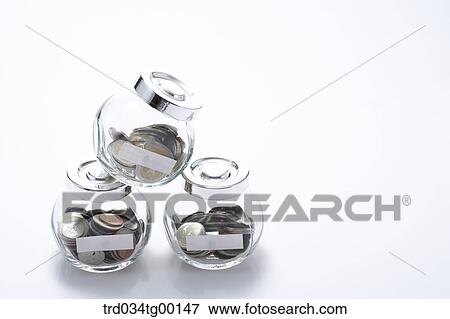 coins in glass bottle View Large Photo Image Stock Photo - coins in glass bottle. Fotosearch