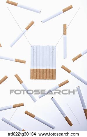 Picture - Colorful disposable lighter with a cigarette. Fotosearch