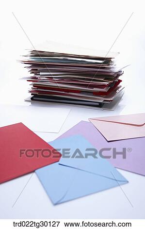 Stock Photo - Colorful envelopes and pack of cards. Fotosearch