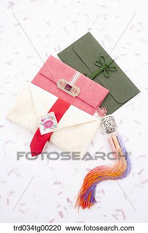 Colorful envelopes with traditional clothes accessory View Large Photo Image Stock Image - Colorful envelopes with traditional clothes accessory . Fotosearch