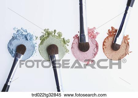 Colorful eye shadow with cosmetic brushes View Large Photo Image Stock Photography - Colorful eye shadow with cosmetic brushes. Fotosearch