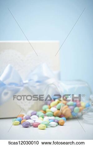 Stock Image - Colorful jelly and gift box . Fotosearch