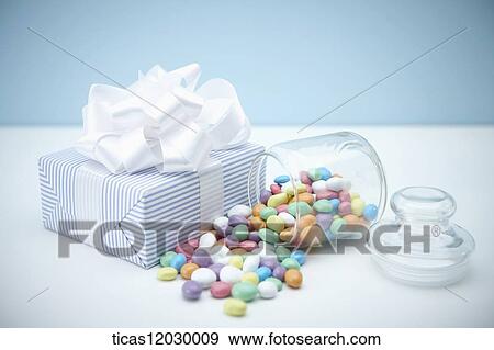 Stock Photo - Colorful jelly and gift box . Fotosearch