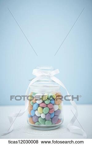 Colorful jelly in a glass jar View Large Photo Image Stock Photo - Colorful jelly in a glass jar. Fotosearch