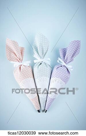 Stock Photo - Colorful polka dot icing bag. Fotosearch