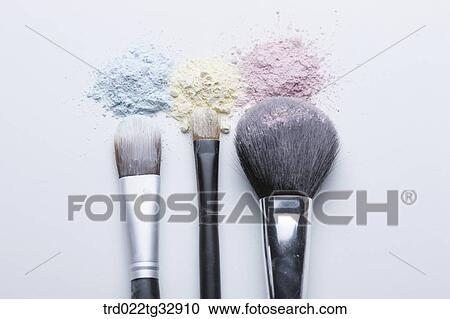 Colorful powder and cosmetic brush View Large Photo Image Stock Image - Colorful powder and cosmetic brush. Fotosearch