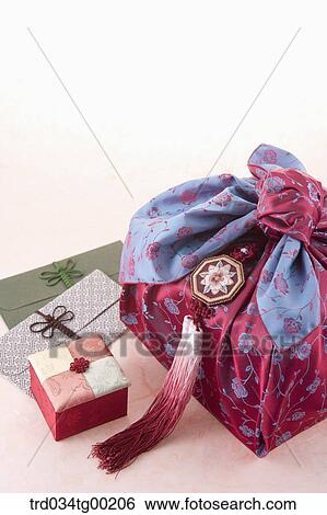 Colrful envelopes and traditonal box with red wrapped package View Large Photo Image Stock Photograph - Colrful envelopes and traditonal box with red wrapped package . Fotosearch