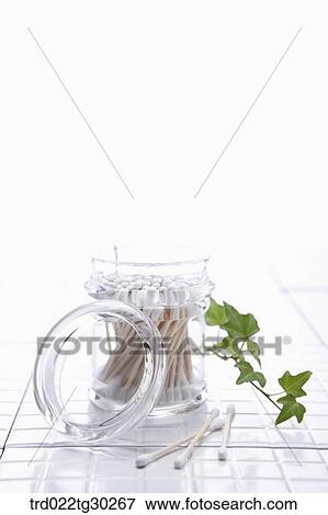 Cotton swaps in plastic container View Large Photo Image Stock Photo - Cotton swaps in plastic container . Fotosearch