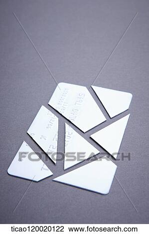 Credit card cut in pieces View Large Photo Image Stock Image - Credit card cut in pieces. Fotosearch