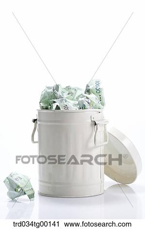 crumpled money bills in waste bucket View Large Photo Image Stock Image - crumpled money bills in waste bucket. Fotosearch
