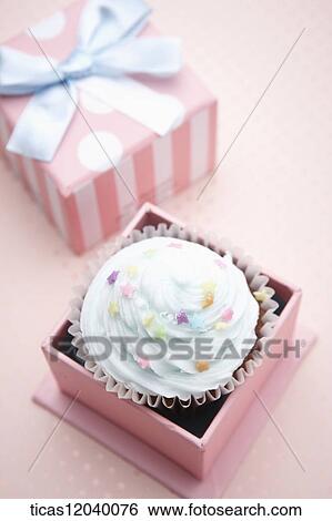 Stock Photograph - Cupcake in pink gift box. Fotosearch