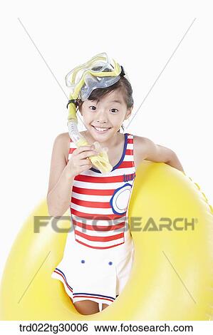 girl is wearing snorkels and tube View Large Photo Image Stock Photograph - girl is wearing snorkels and tube. Fotosearch