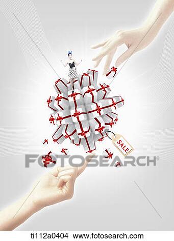 Hands picking up the gifts with sale tag View Large Photo Image Picture - Hands picking up the gifts with sale tag. Fotosearch