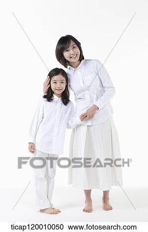 Stock Image - Happy mother and daughter. Fotosearch