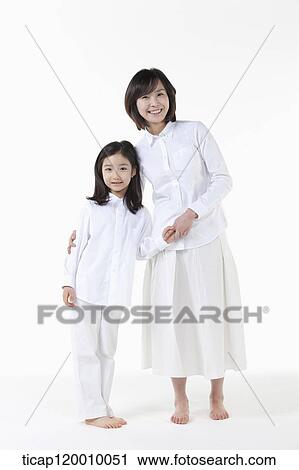 Stock Image - Happy mother and daughter. Fotosearch