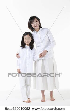 Stock Image - Happy mother and daughter. Fotosearch