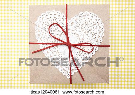Heart lace gift box with red ribbon View Large Photo Image Stock Image - Heart lace gift box with red ribbon . Fotosearch