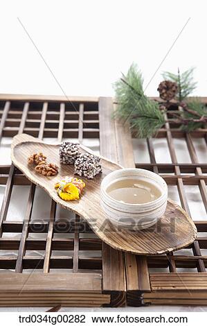 Korean dessert and a cup of tea on Korean traditional door View Large Photo Image Stock Image - Korean dessert and a cup of tea on Korean traditional door. Fotosearch