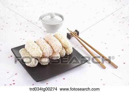 Korean dessert and chopsticks with a cup of tea View Large Photo Image Picture - Korean dessert and chopsticks with a cup of tea. Fotosearch