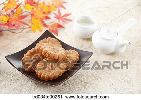 Korean dessert with tea setting and colored leaves View Large Photo Image Stock Image - Korean dessert with tea setting and colored leaves. Fotosearch