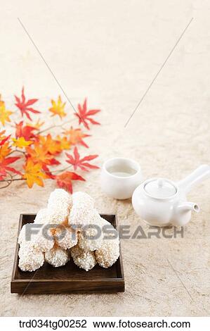 Korean dessert with tea setting and colored leaves View Large Photo Image Stock Image - Korean dessert with tea setting and colored leaves. Fotosearch