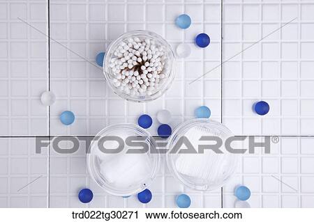 Make up cotton, cotton swap, and cotton in the plastic containers from the above View Large Photo Image Stock Image - Make up cotton, cotton swap, and cotton in the plastic containers from the above. Fotosearch