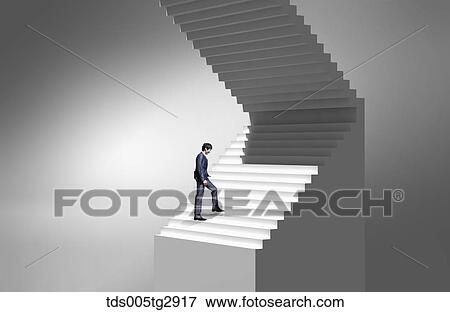 Stock Photo - man is going upstairs. Fotosearch