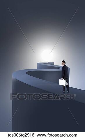 man is holding brief case which were filled with money View Large Photo Image Stock Photograph - man is holding brief case which were filled with money. Fotosearch