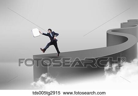 man is jumping high holding briefcase View Large Photo Image Stock Photography - man is jumping high holding briefcase. Fotosearch